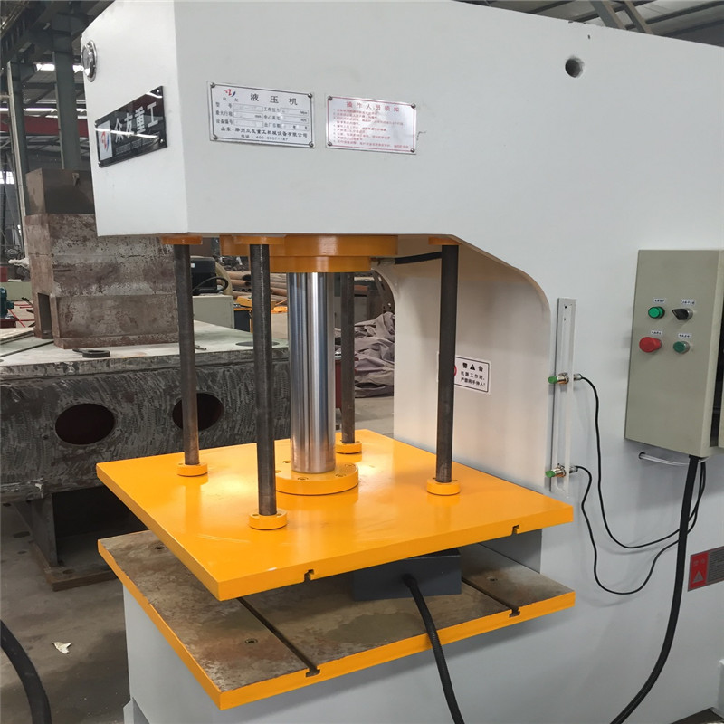 63噸臺(tái)面750×700帶導(dǎo)柱單臂液壓機(jī)